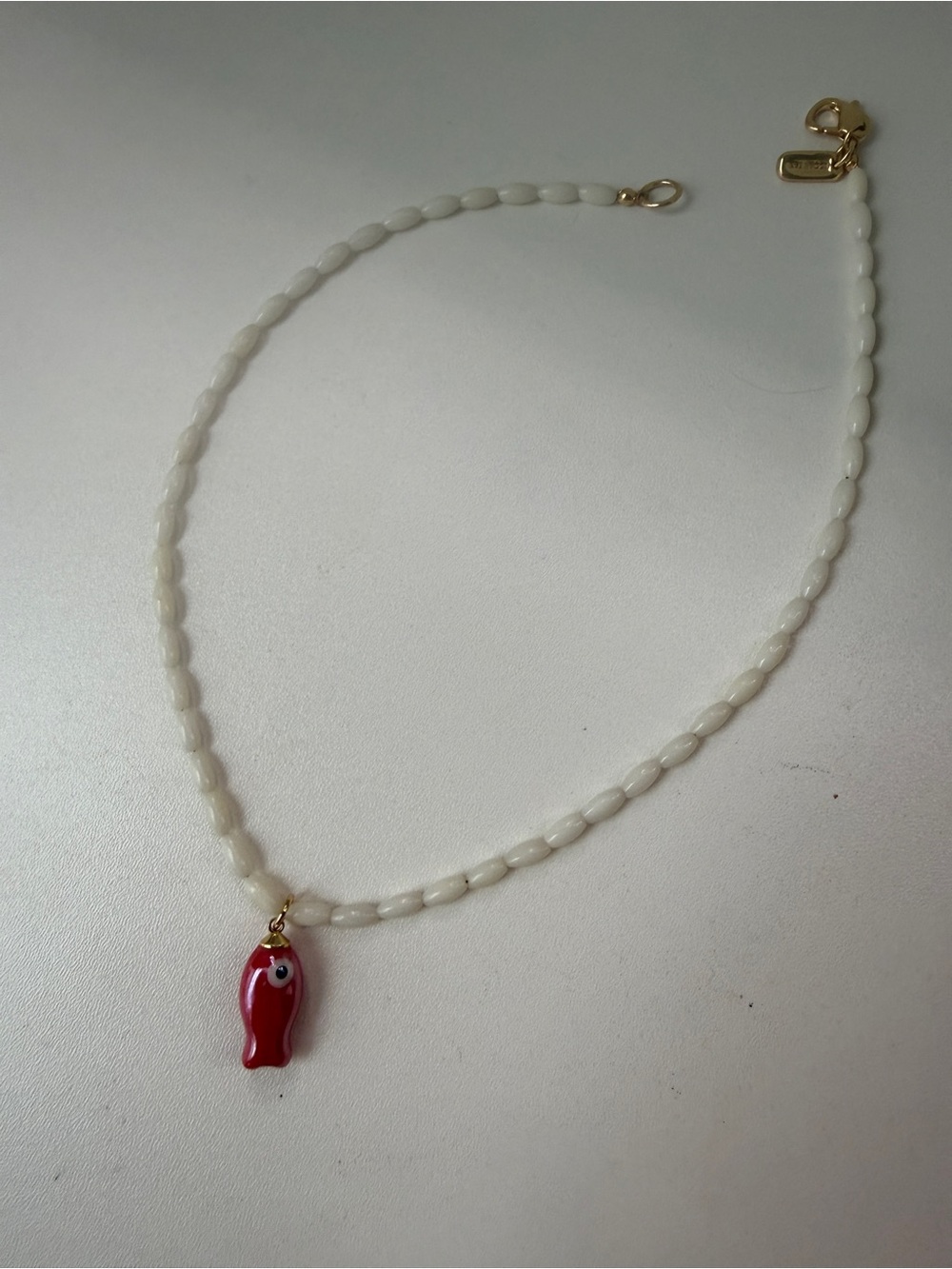 Logan Tay fish necklace